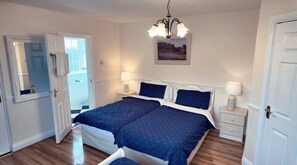 Suite, salle de bain attenante | 1 chambre