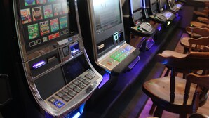 A row of slot machines with a selection of games, including 'Crystal Forest'. - Cosmopolitan Hotel (Blairmore)