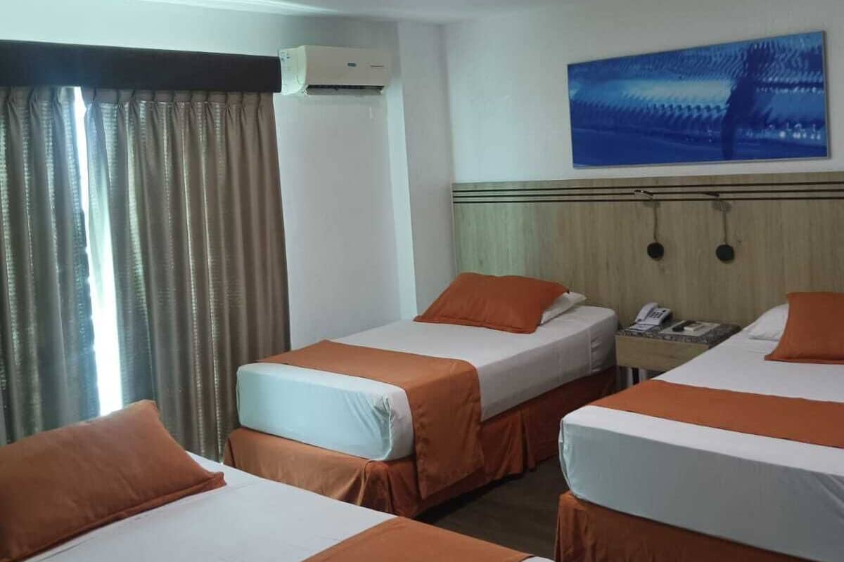 Family Triple Room, Balcony, City View | Premium bedding, down comforters, minibar, in-room safe