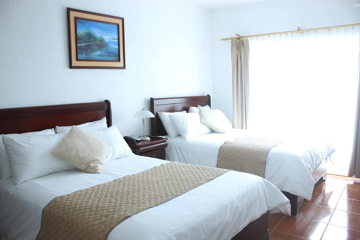 Premium bedding, down comforters, minibar, in-room safe