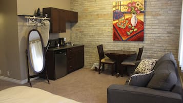 Suite Deluxe | Coin séjour | Télévision LED de 40 pouces avec chaßnes par cùble, télévision