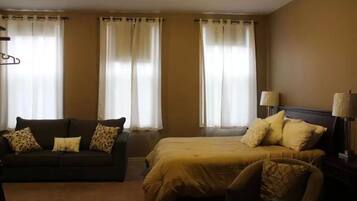 Blackout drapes, soundproofing, iron/ironing board, free WiFi