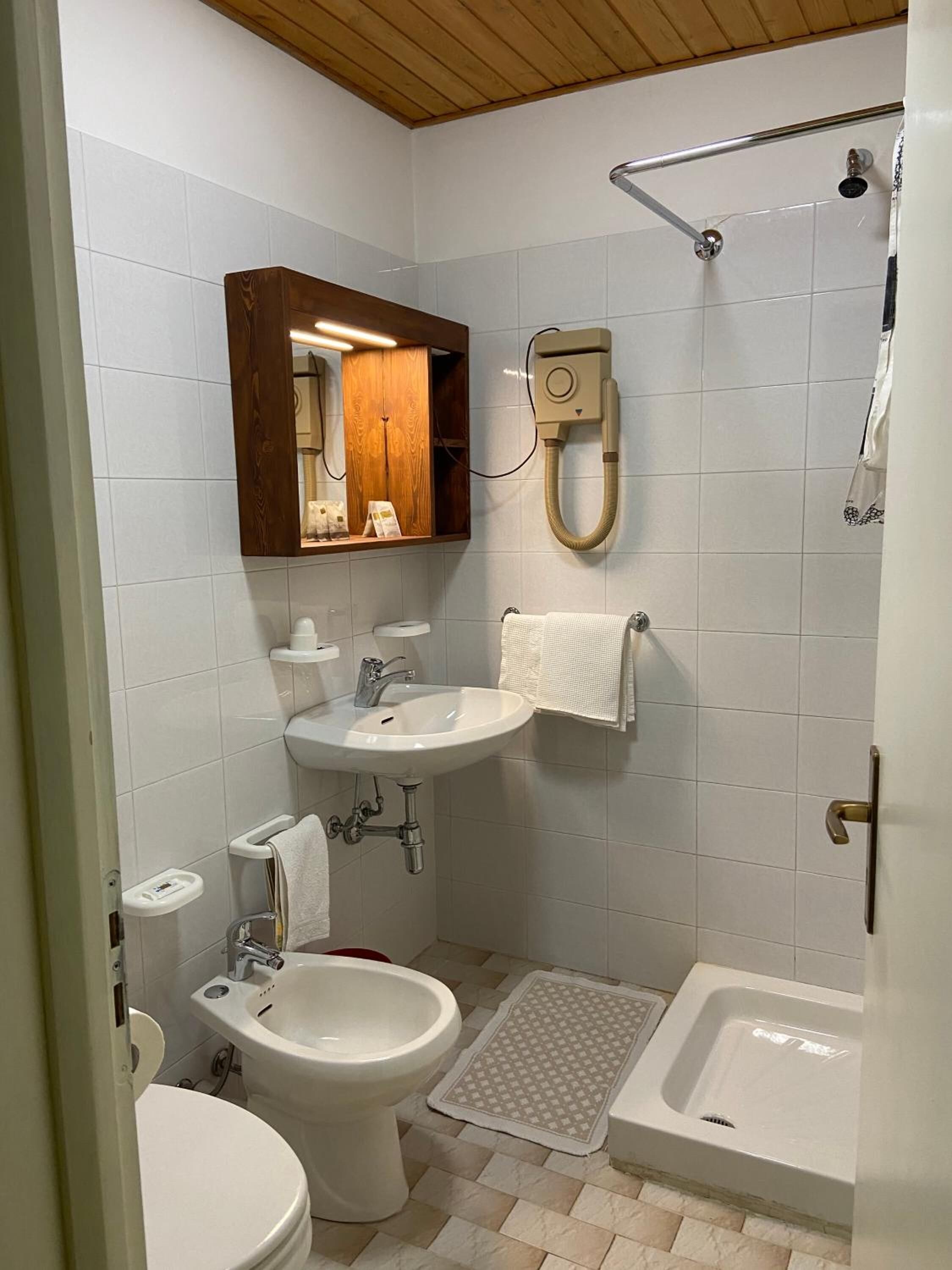 shower, free toiletries, hair dryer, bathrobes