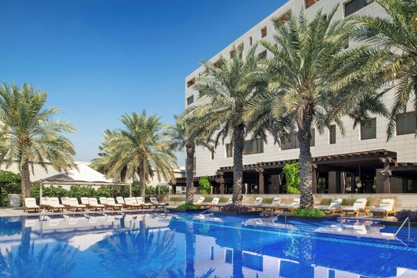 Indoor pool, outdoor pool, open 7:00 AM to 9:00 PM, pool umbrellas