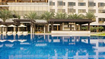 Indoor pool, outdoor pool, open 7:00 AM to 9:00 PM, pool umbrellas