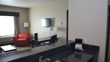 Luxury Suite, 1 Bedroom | Living room | 37-inch LCD TV with satellite channels, TV