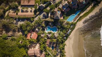 On the beach, sun loungers, beach umbrellas, beach towels