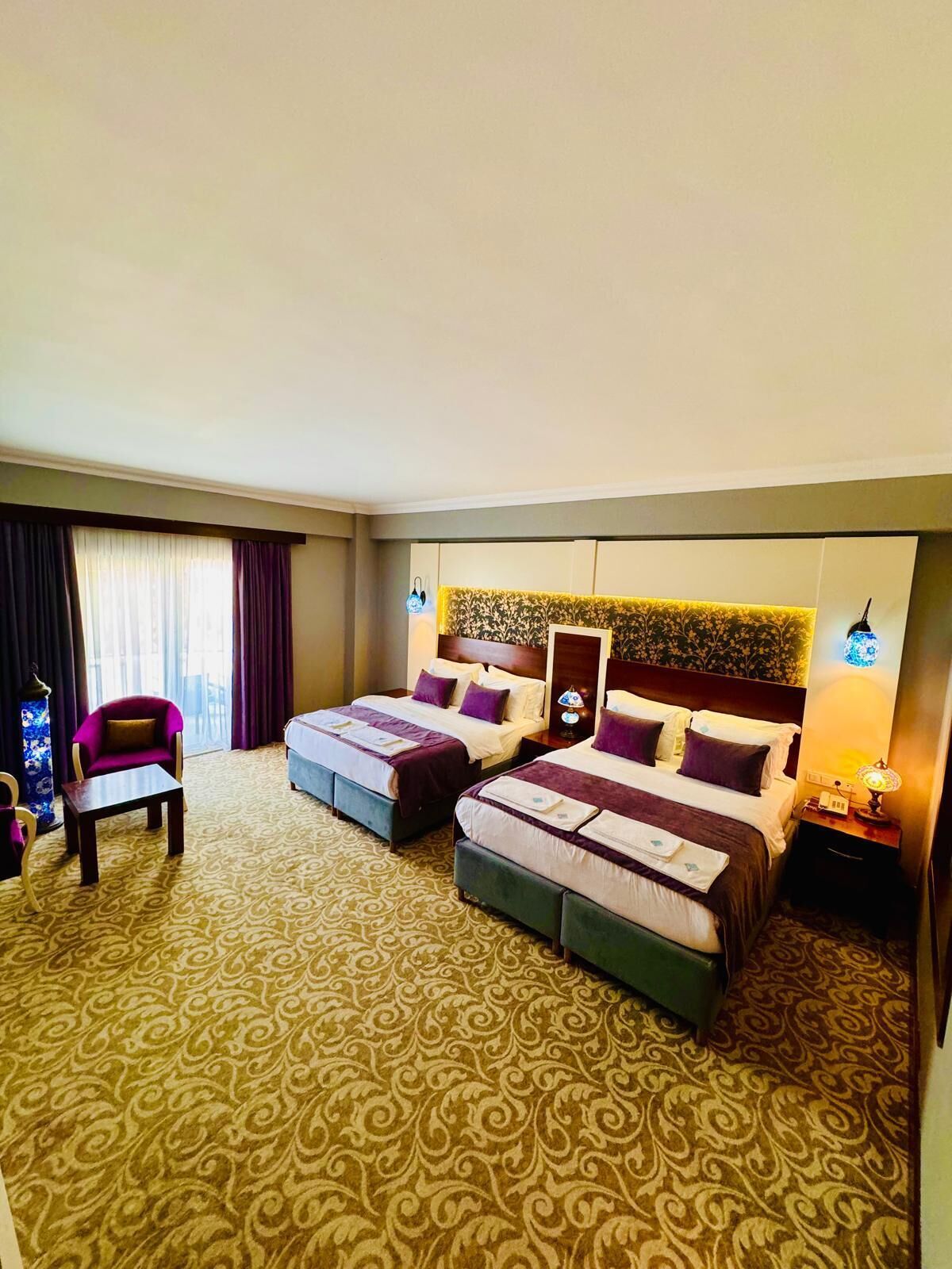 deluxe quadruple room, 1 bedroom, non smoking | premium bedding, minibar, in-room safe, individually decorated