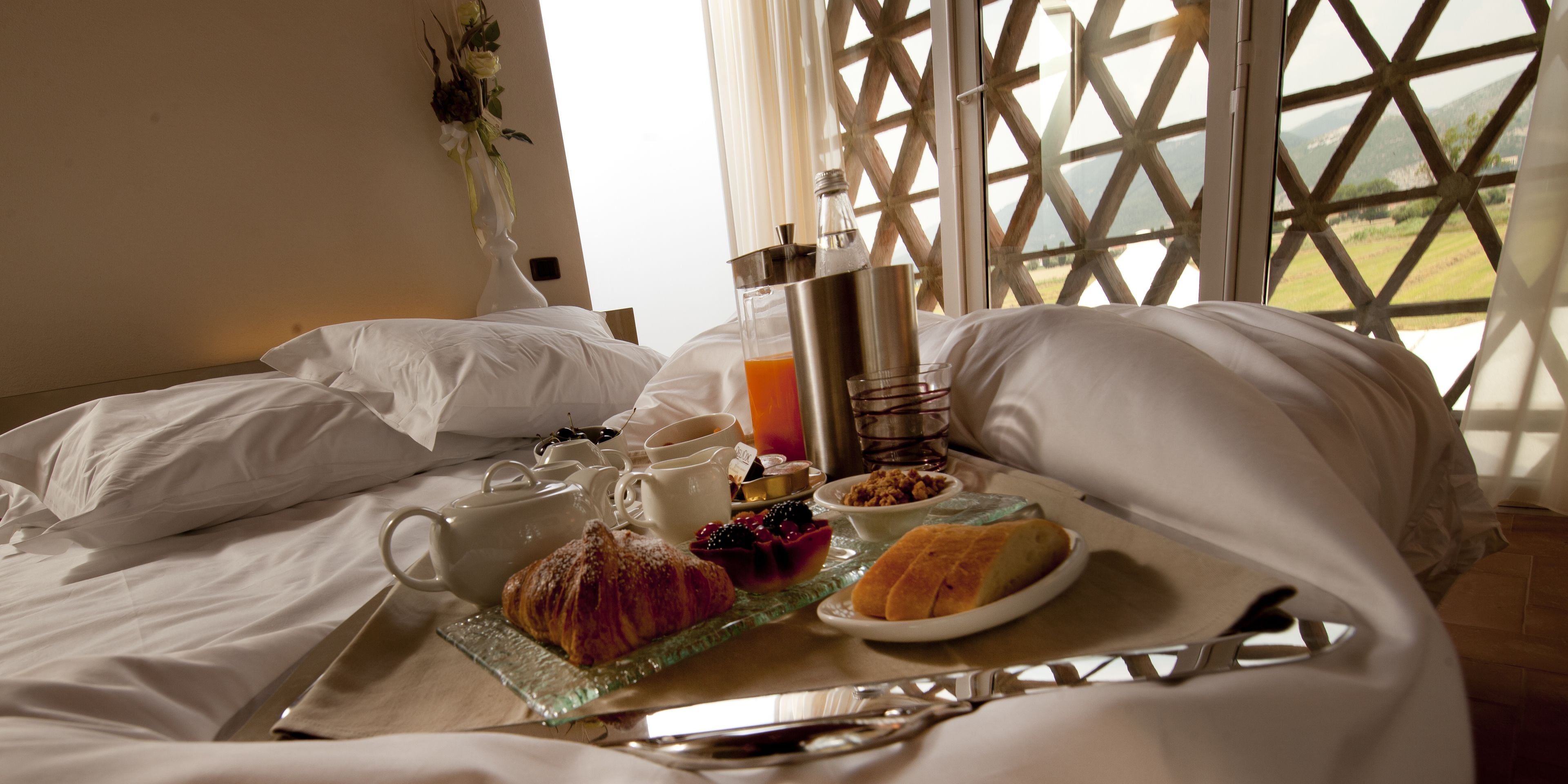 deluxe room, private bathroom, garden view | premium bedding, in-room safe, desk, laptop workspace