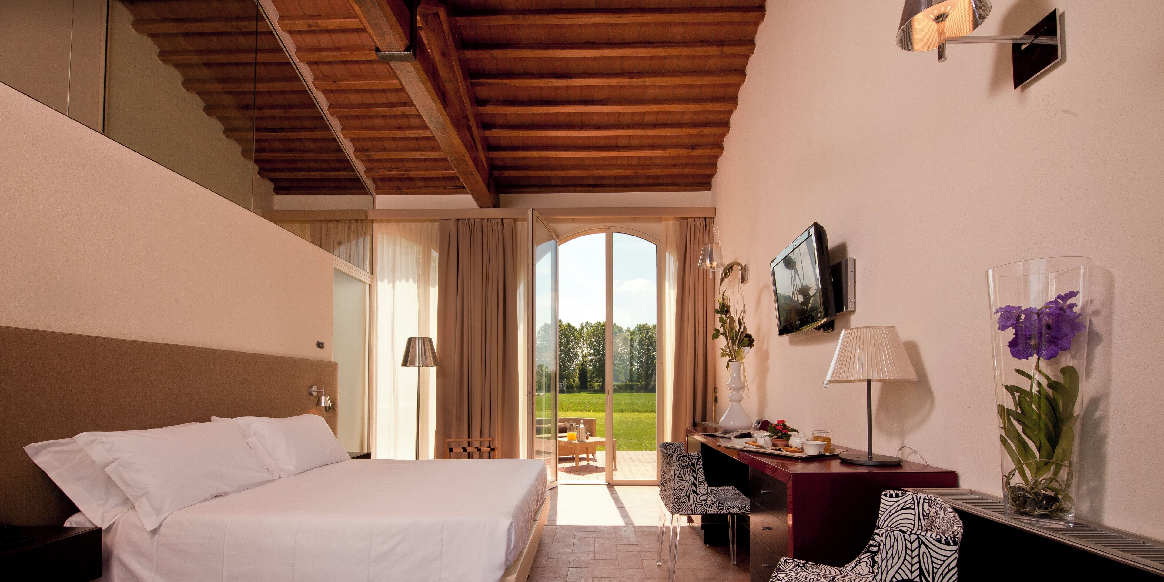 junior triple room, private bathroom, garden view | premium bedding, in-room safe, desk, laptop workspace