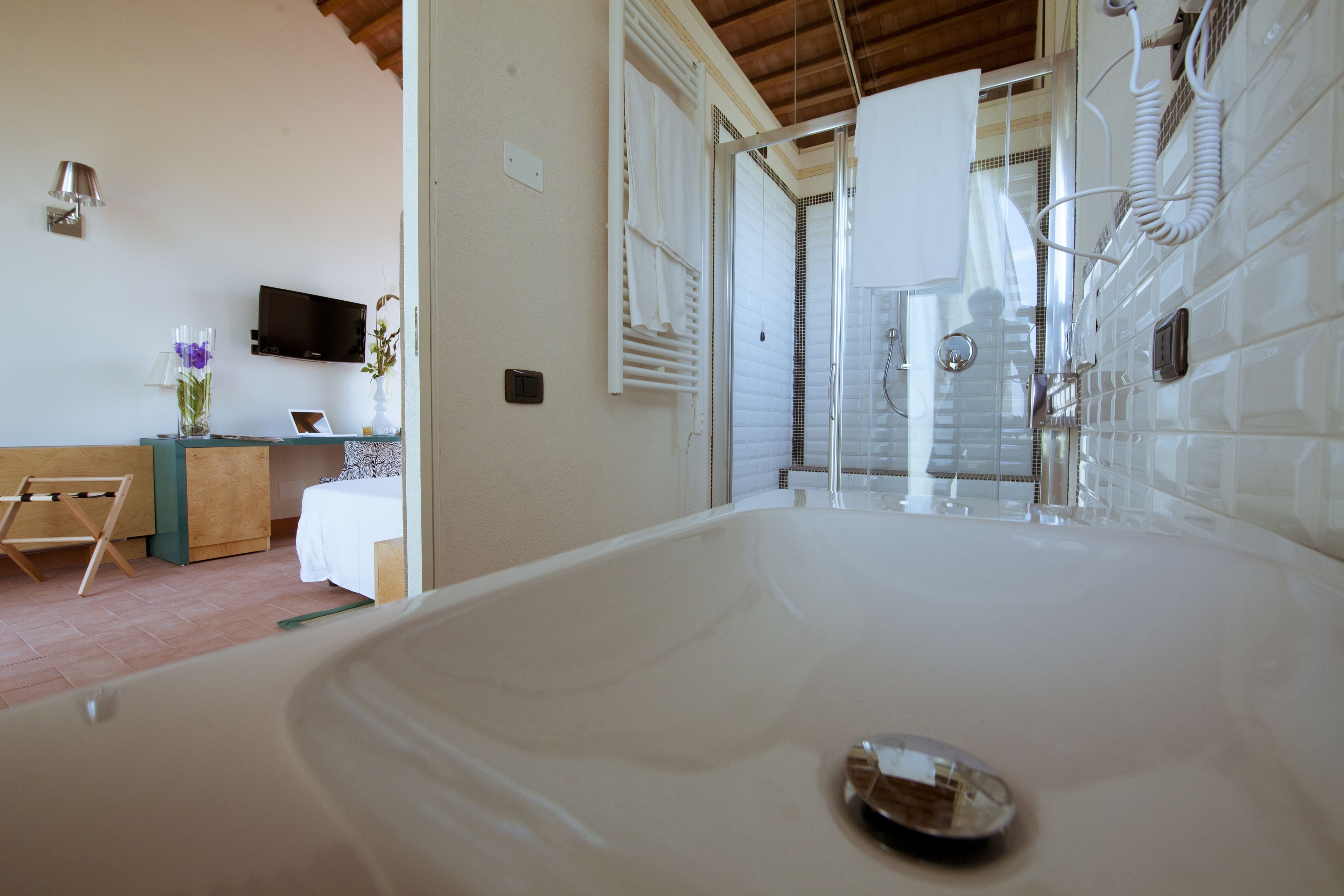 junior triple room, private bathroom, garden view | bathroom | shower, rainfall showerhead, free toiletries, hair dryer