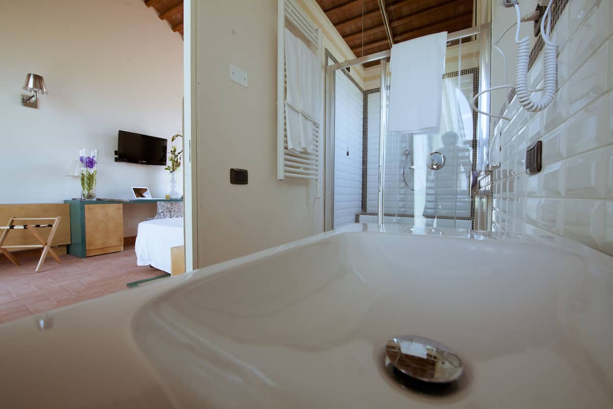 junior triple room, private bathroom, garden view | bathroom | shower, rainfall showerhead, free toiletries, hair dryer