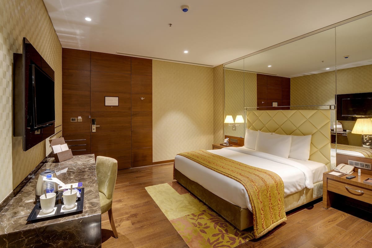 premium queen room | premium bedding, in-room safe, desk, blackout curtains