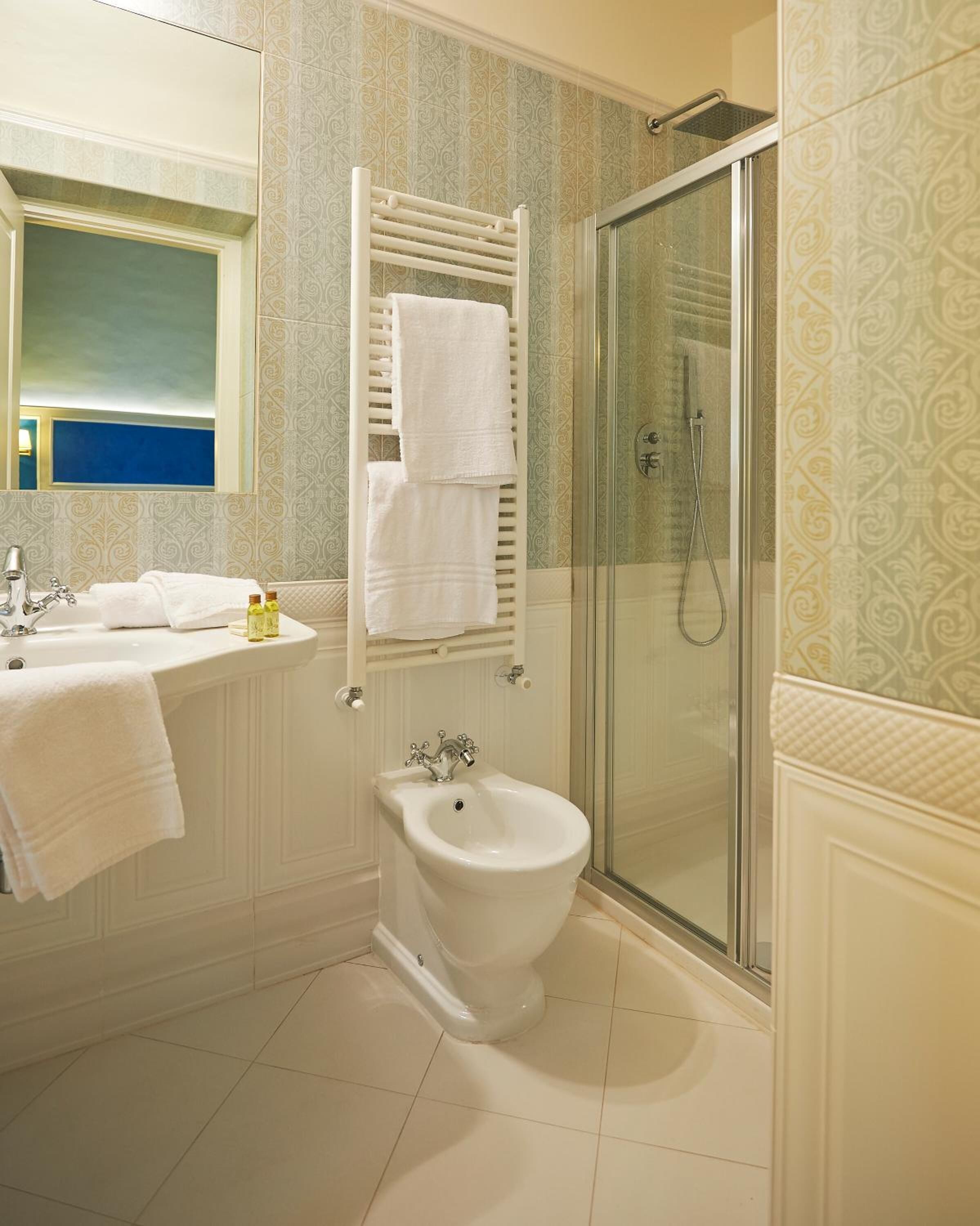 superior double room | bathroom | free toiletries, hair dryer, slippers, towels