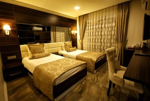 Ropa de cama de alta calidad, minibar y sistema de insonorización 