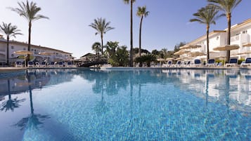 Indoor pool, pool umbrellas, pool loungers