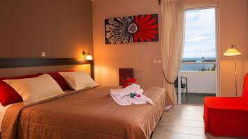 Suite, 2 Bedrooms, Sea View | In-room safe, soundproofing, iron/ironing board, free WiFi