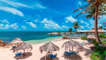 On the beach, beach umbrellas, beach towels