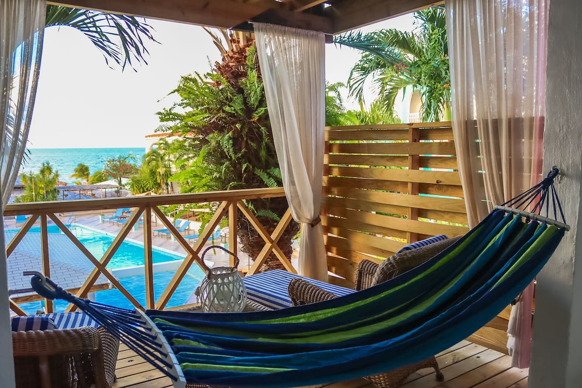 Partial Ocean View Cabana | 1 bedroom, minibar, in-room safe, individually decorated