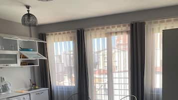 Family Duplex, 1 Bedroom, City View | Living area | 43-inch LCD TV with satellite channels, TV, Netflix