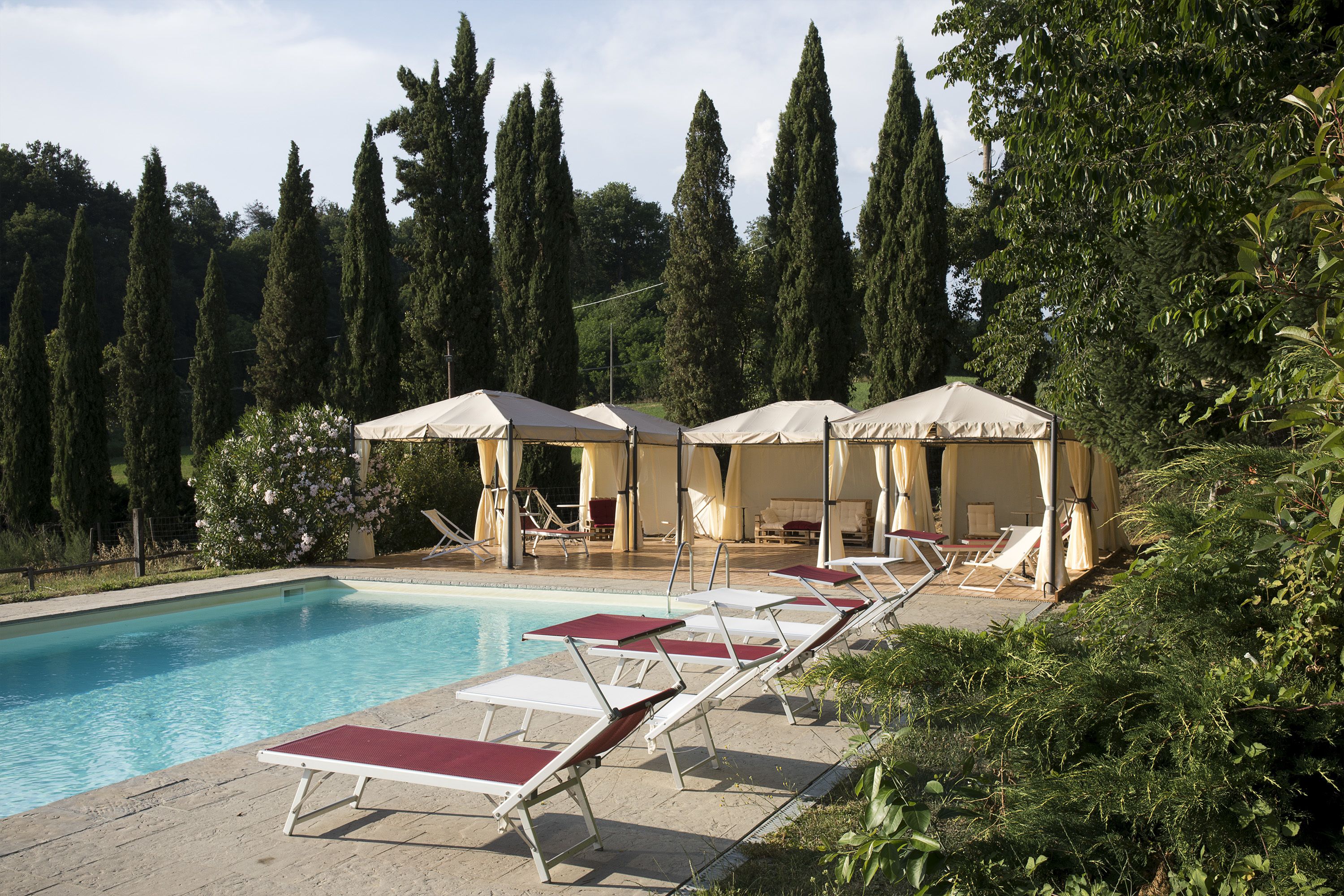 Outdoor pool, pool umbrellas, sun loungers