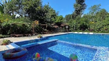Outdoor pool, pool umbrellas, pool loungers