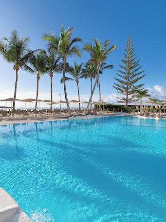 Outdoor pool, pool umbrellas, sun loungers