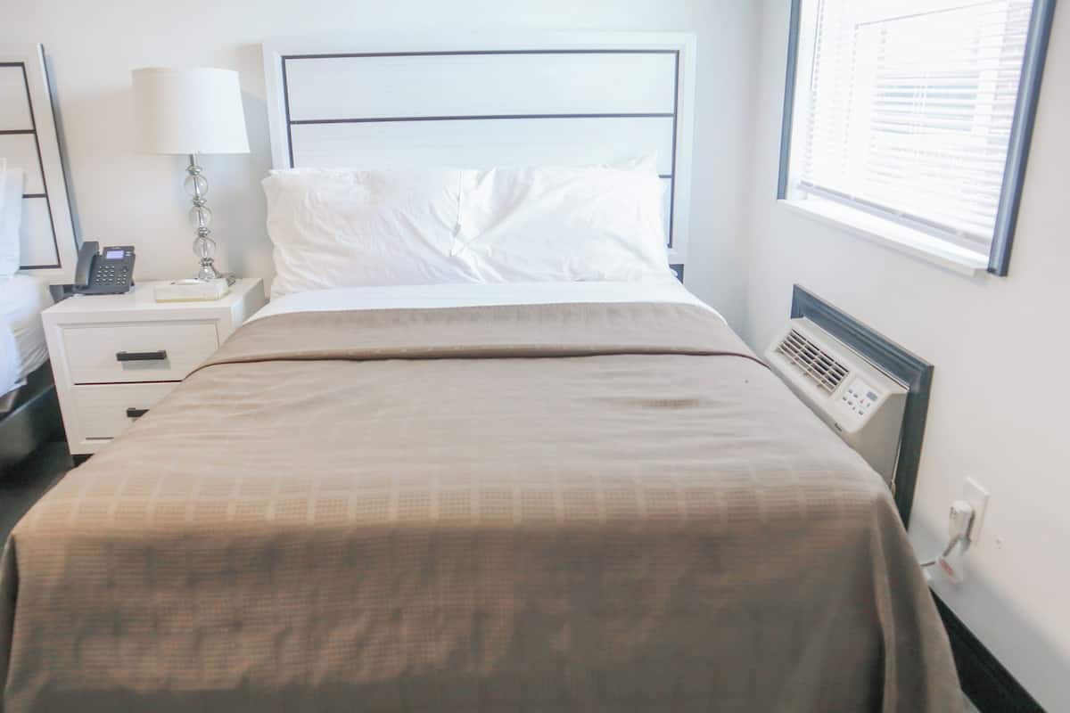 Standard Room, 2 Double Beds | Desk, iron/ironing board, free WiFi, bed sheets