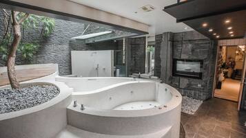 Combined shower/bathtub, deep-soaking bathtub, rainfall showerhead