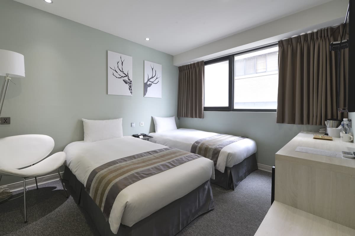 Tvåbäddsrum (2 Single Beds) | Duntäcken, skrivbord, ljudisolering och gratis wi-fi