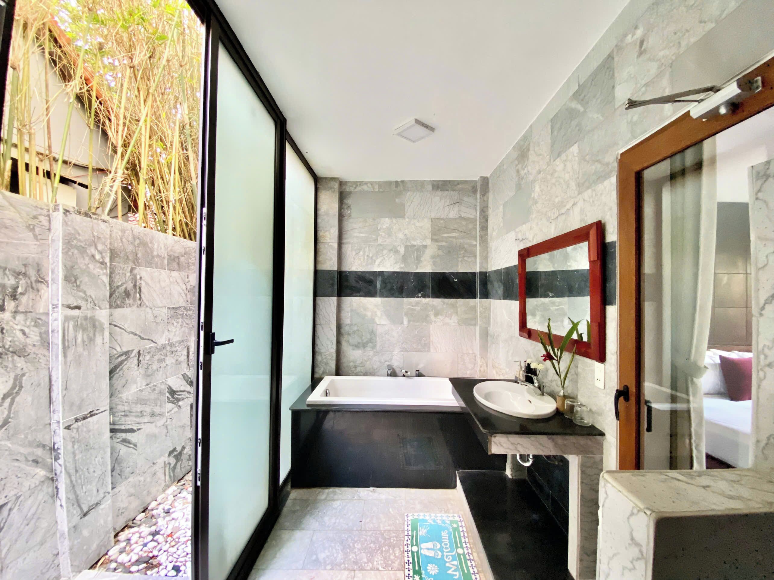 family room | bathroom | separate bathtub and shower, deep-soaking bathtub, free toiletries