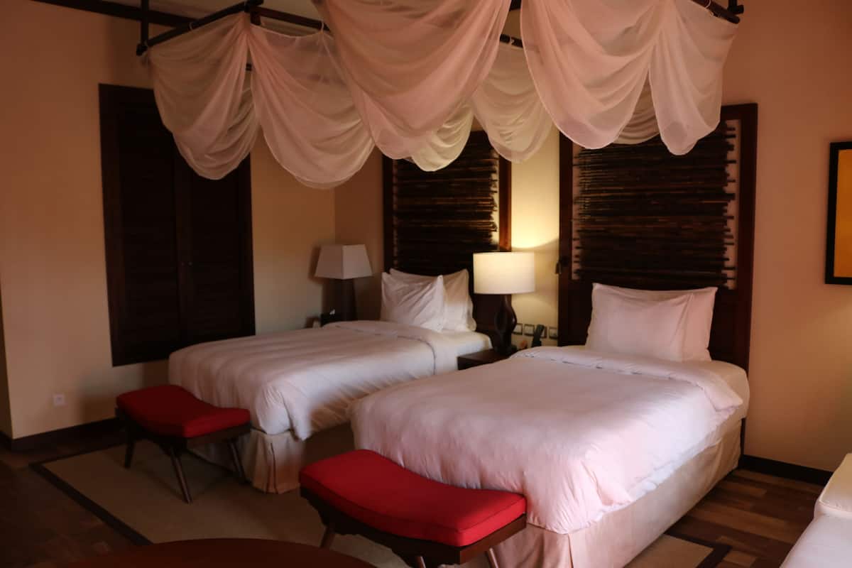 Hypo-allergenic bedding available, down comforters, minibar