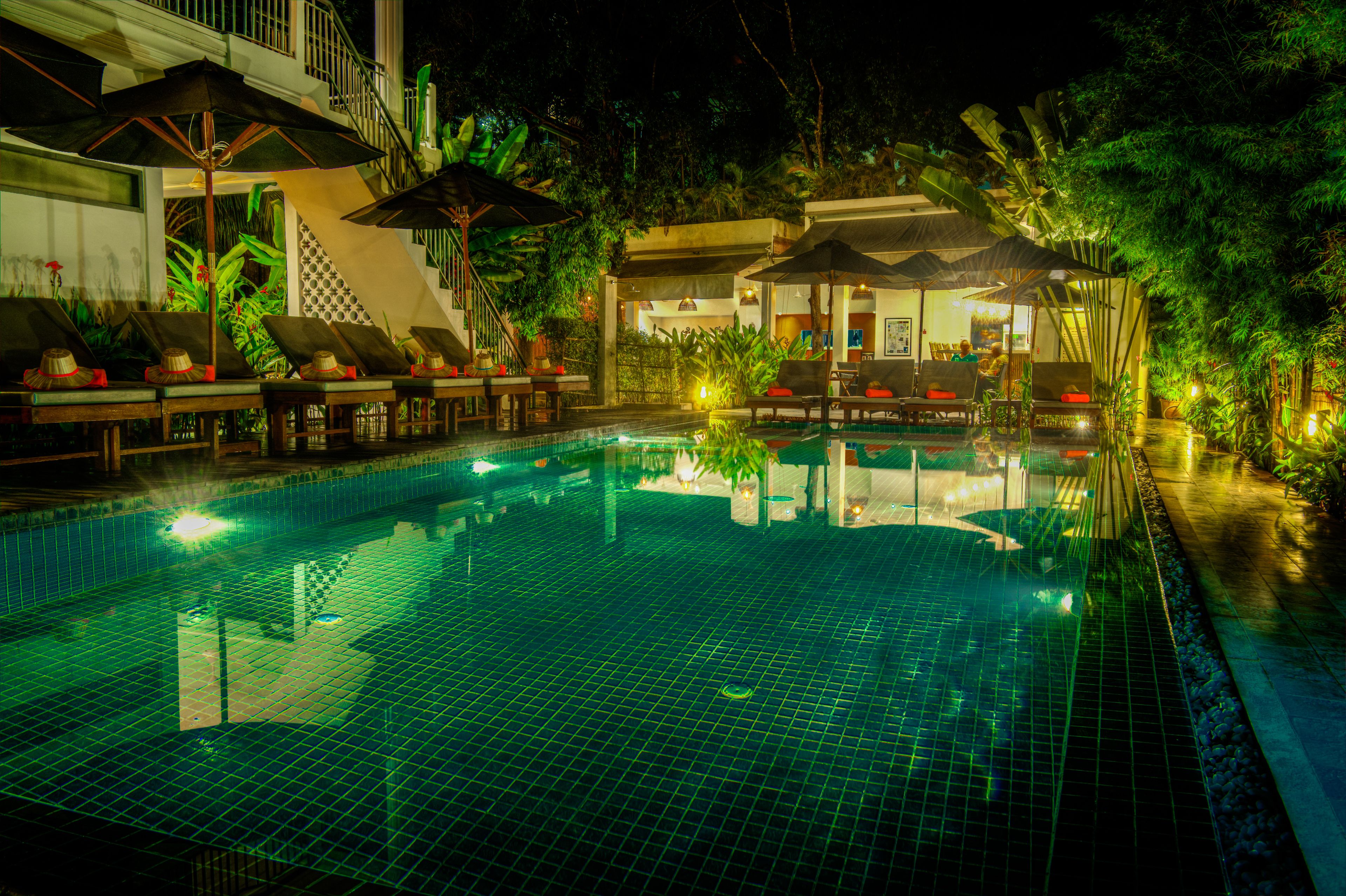 outdoor pool, pool umbrellas, pool loungers