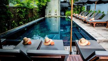 Outdoor pool, pool umbrellas, sun loungers