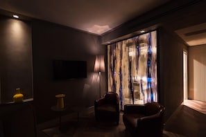 30-inch flat-screen TV with cable channels, TV