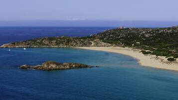 Enjoy breathtaking views of the coastline from the hilltop lighthouse.