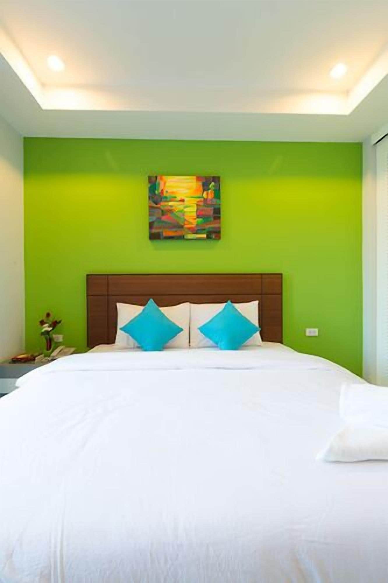 Deluxe King Studio | มินิบาร์, โต๊ะทำงาน, ผ้าม่านกันแสง, เตียงเสริม/เปล