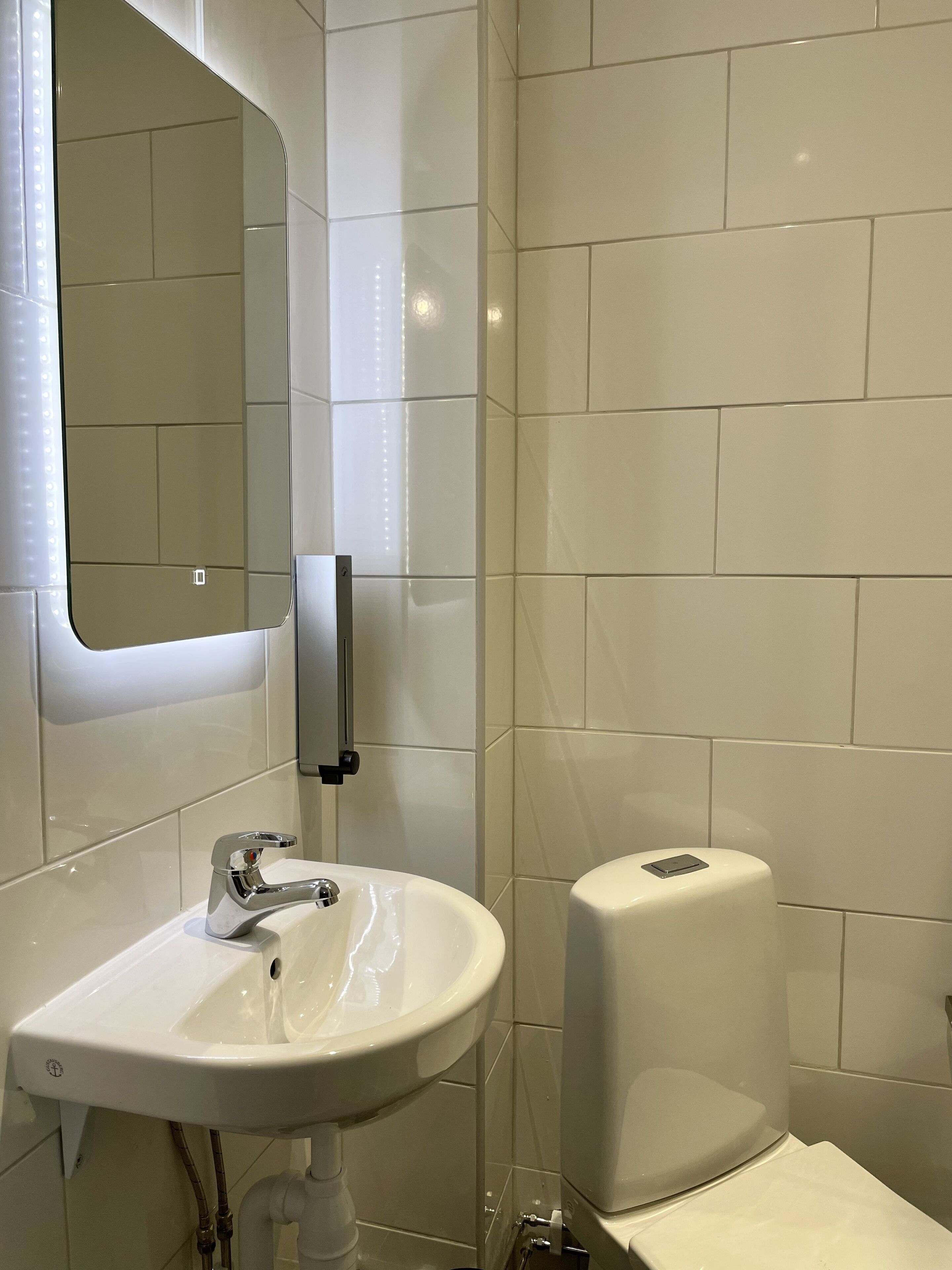 twin room | bathroom | shower, hair dryer, towels, soap