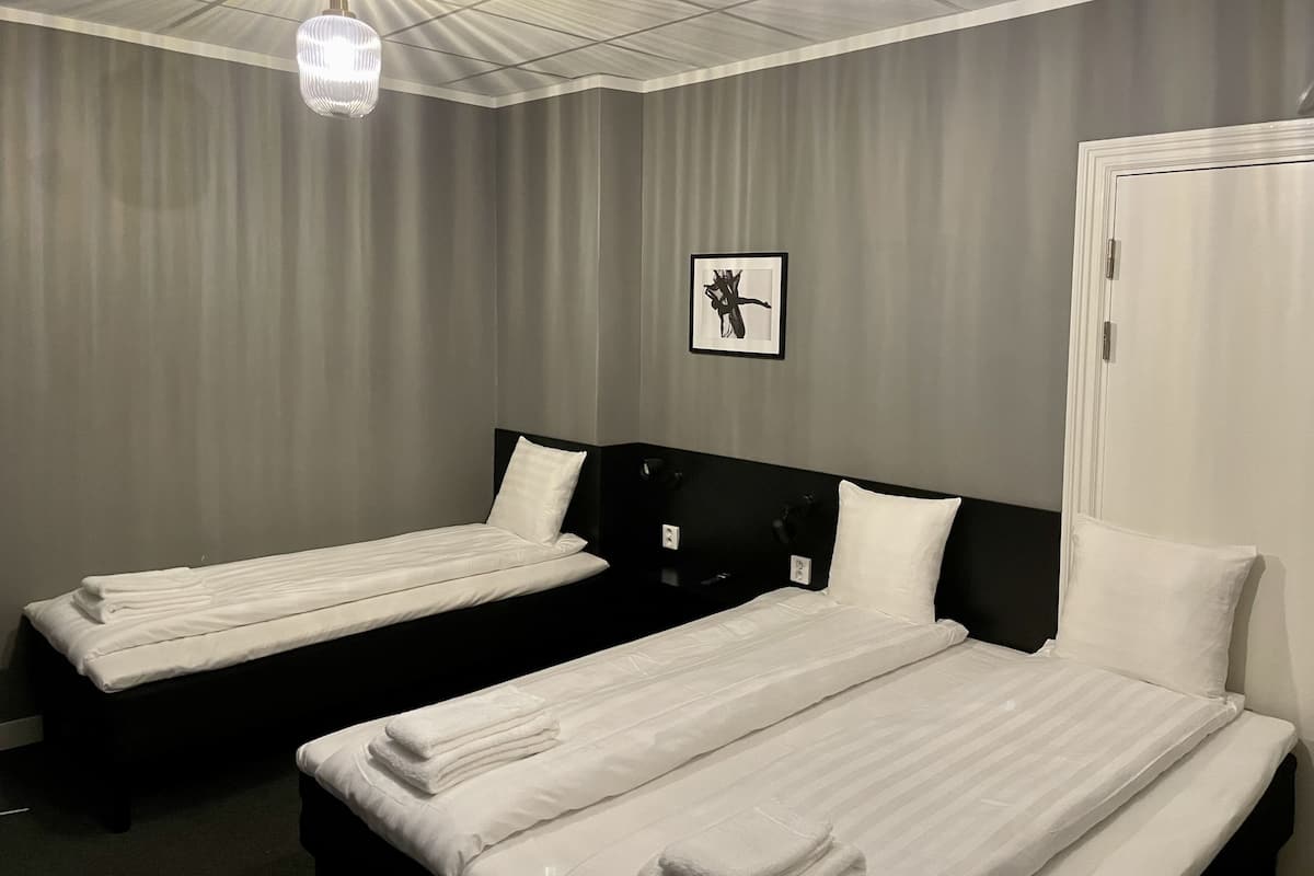 Triple Room, No Windows | Blackout drapes, WiFi, bed sheets