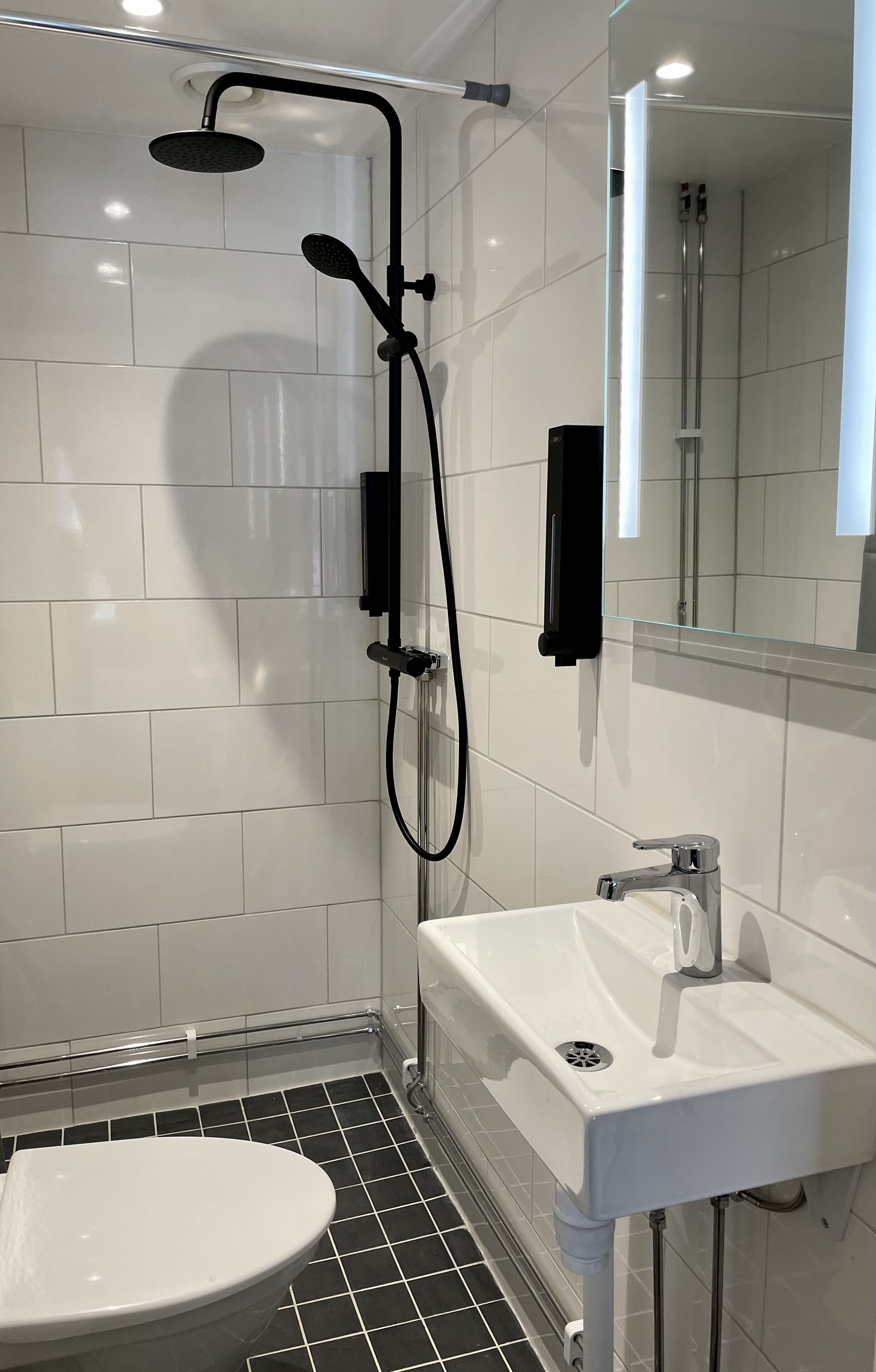 family room | bathroom | shower, hair dryer, towels, soap