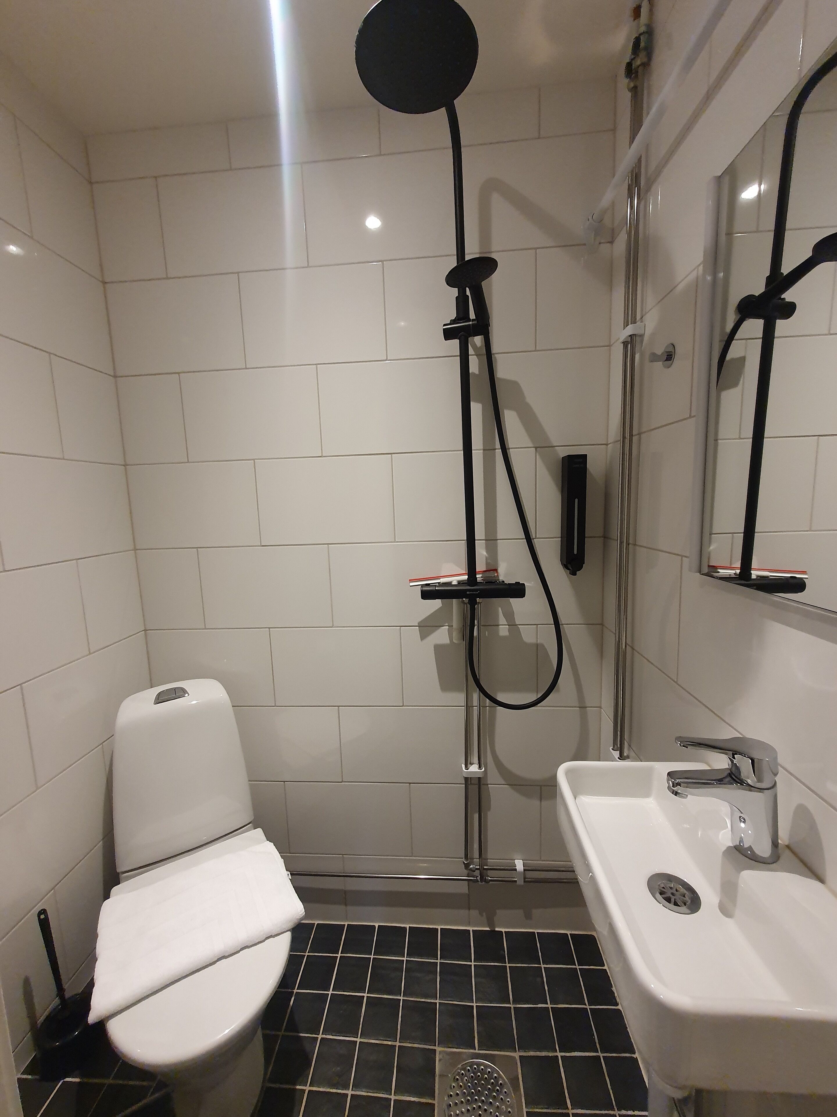 basic double room | bathroom | shower, hair dryer, towels, soap