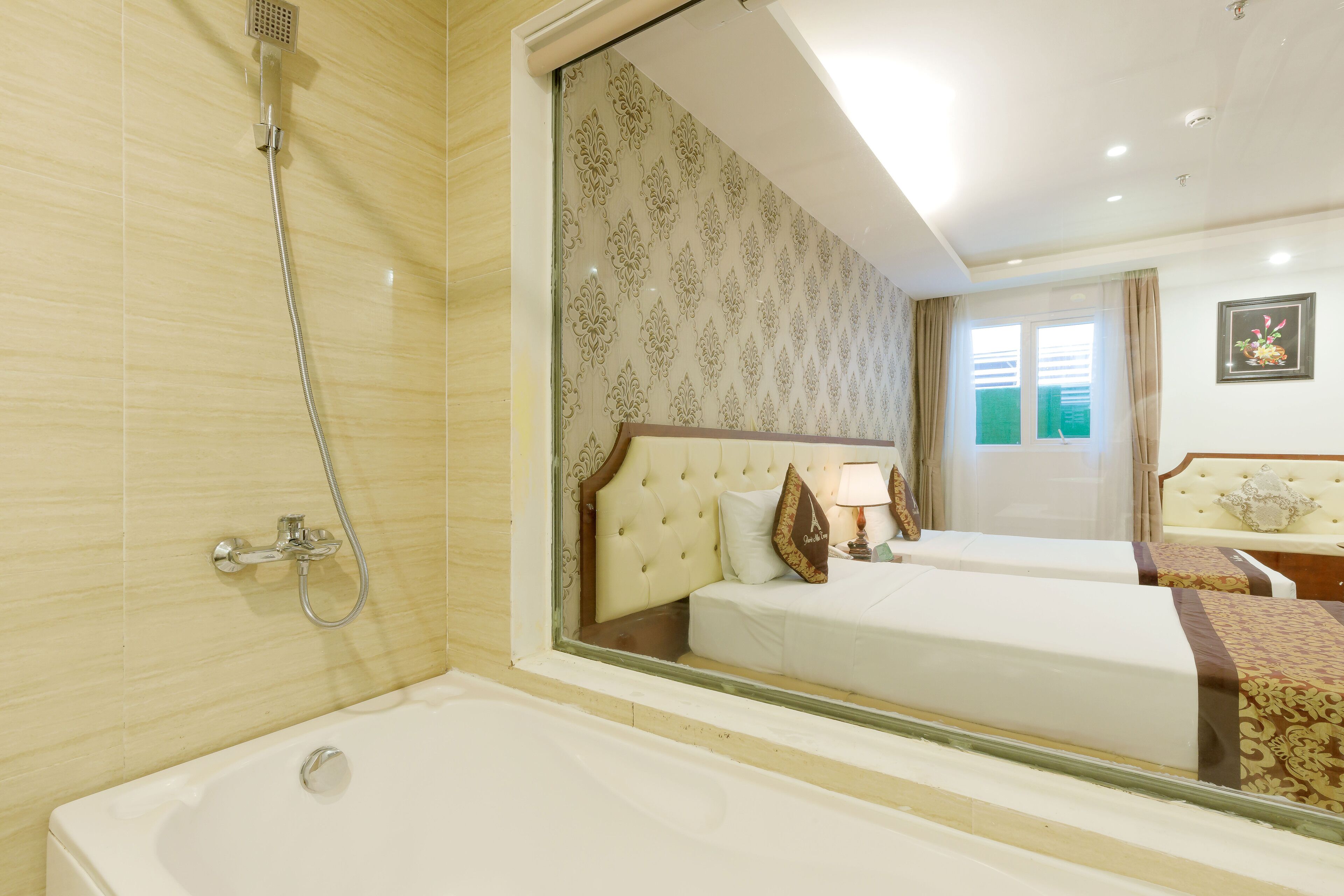 superior twin room (no view) | bathroom | designer toiletries, hair dryer, bathrobes, slippers