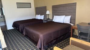 Standard Room, 2 Double Beds (Non Smoking) | Desk, soundproofing, free WiFi, bed sheets - Economy Inn (Garnett)