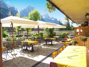 Lunch, dinner served; local cuisine, garden views