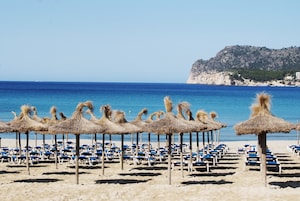 Beach nearby, white sand, sun loungers, beach umbrellas