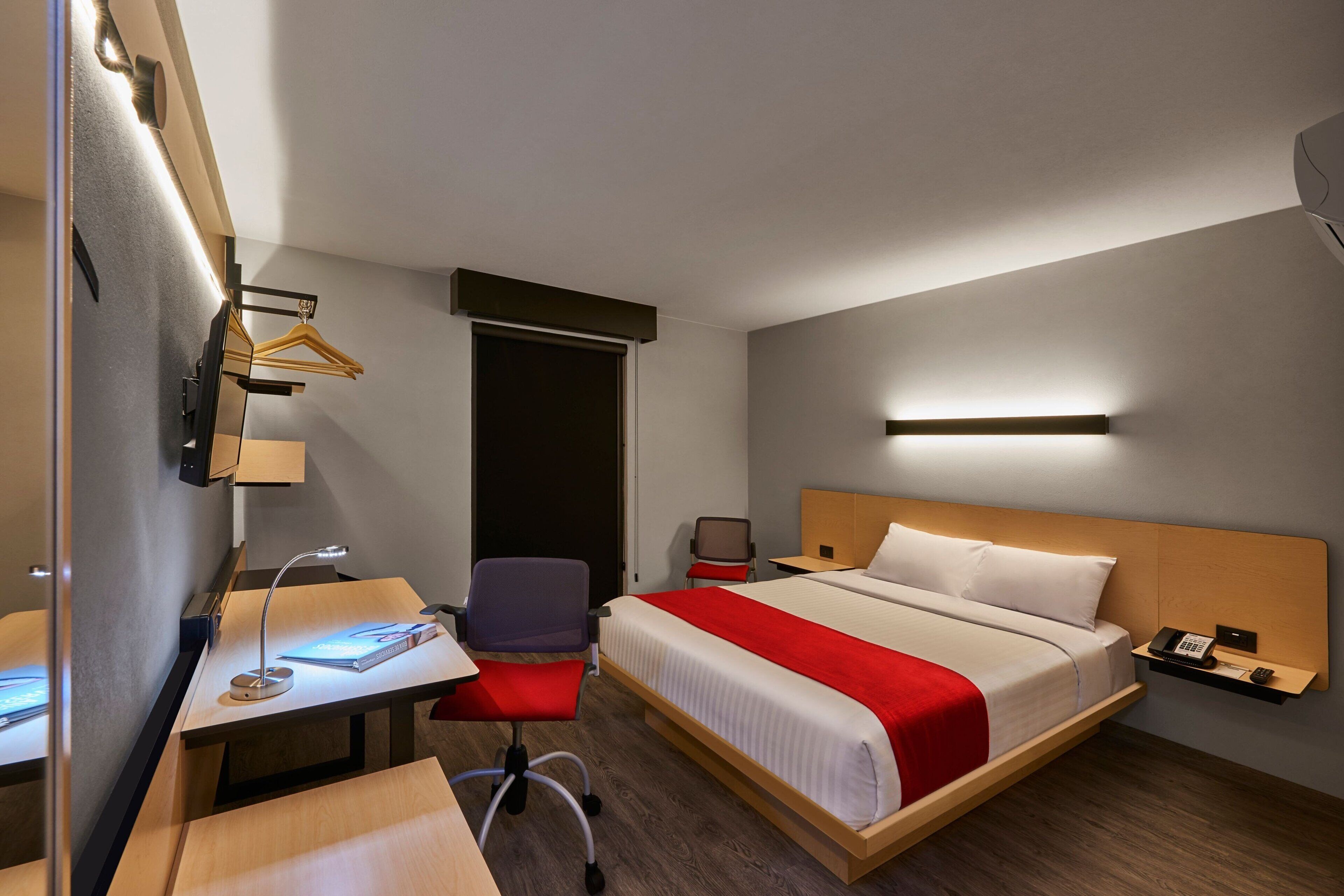 room, 1 queen bed | in-room safe, desk, laptop workspace, iron/ironing board