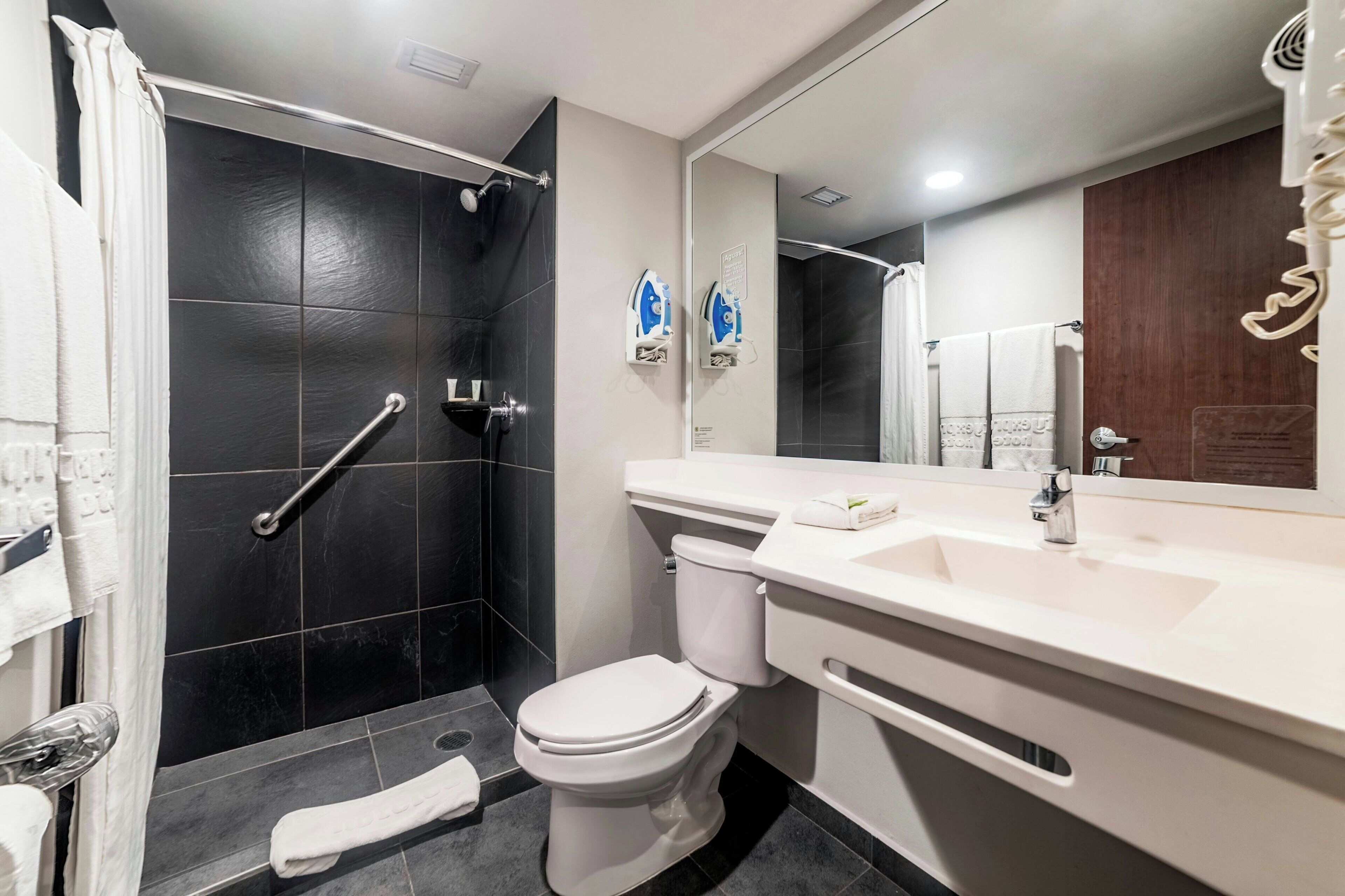 superior room, 1 queen bed with sofa bed | bathroom | shower, free toiletries, hair dryer, towels