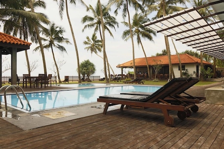 Outdoor pool, pool loungers. Blue Beach
