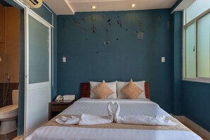 A hotel room with a bed, a nightstand, a telephone, and a window. - 99 Bui Vien Hotel (Ho Chi Minh City)