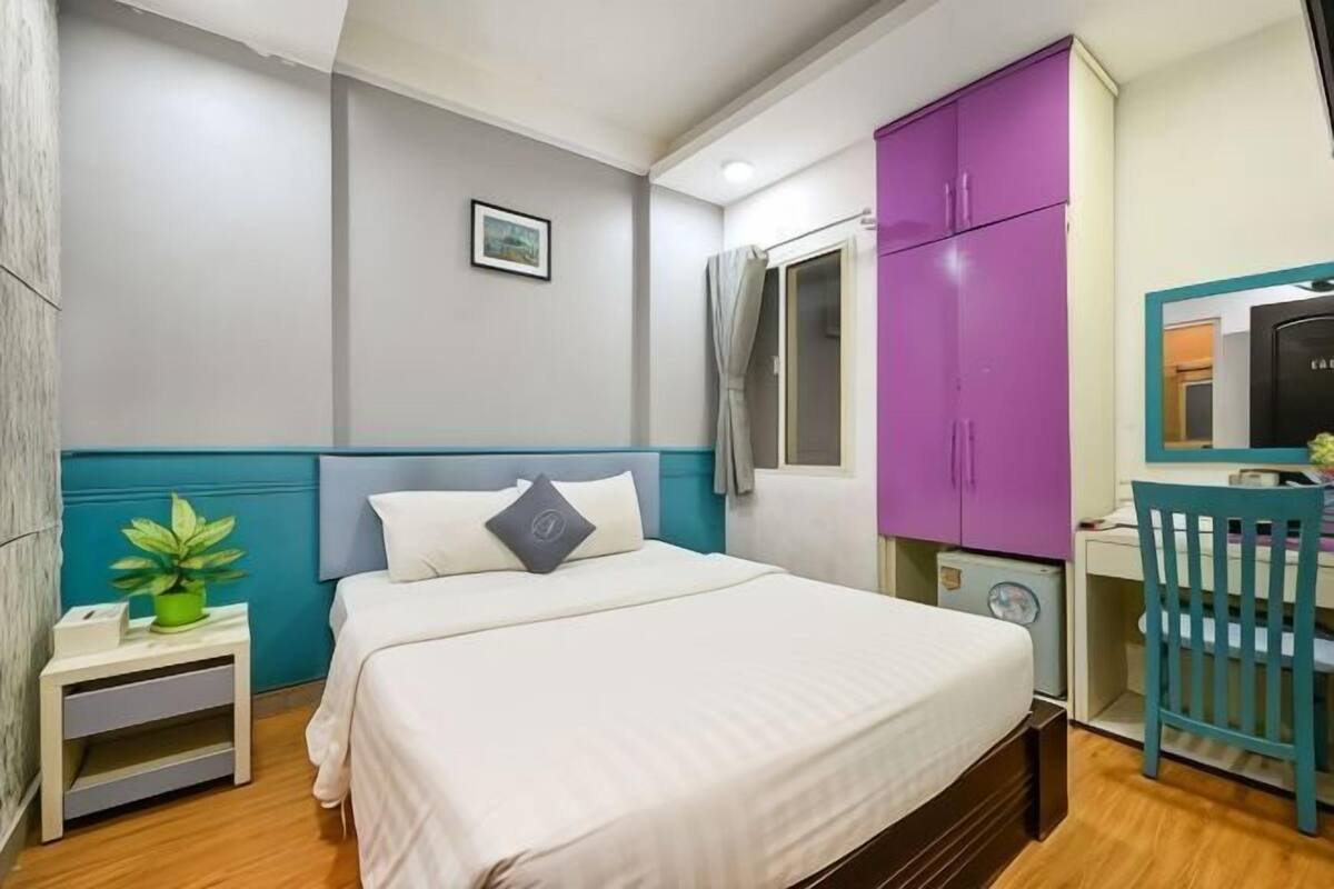 Premium bedding, desk, laptop workspace, soundproofing